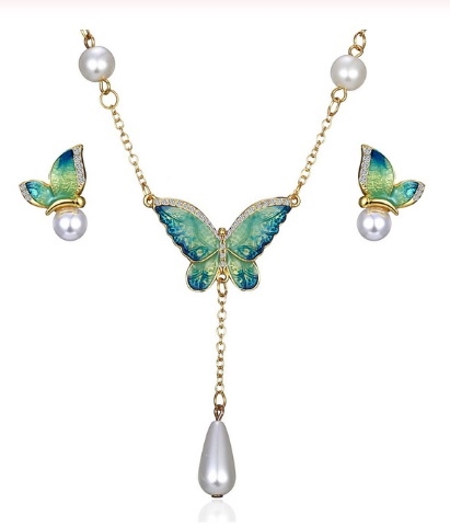 Smykkesæt: blågrøn sommerfugl med perler 